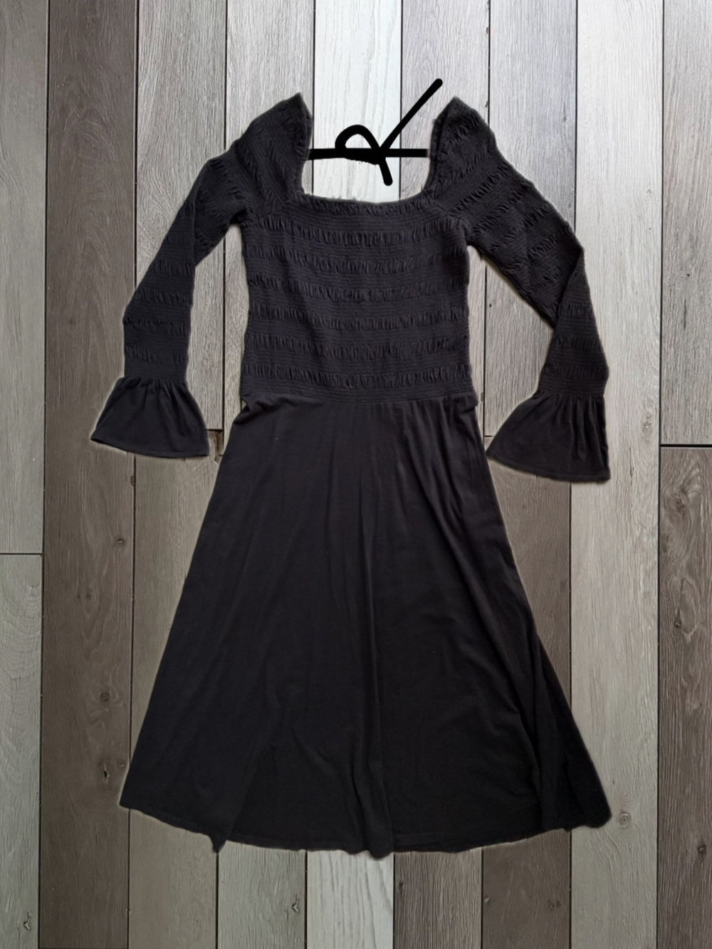 Free People black dress with bell sleeves and tie back